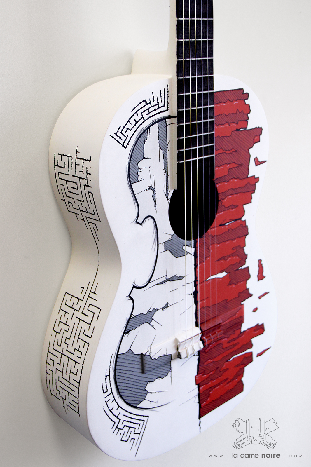 Details of the guitar painted in black and white